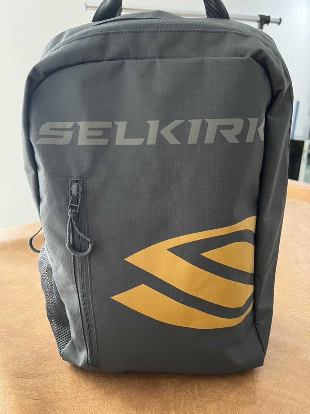 Selkirk Men's Gray Backpack with Yellow Accent